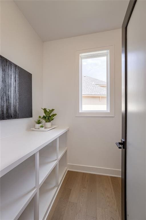12455 N Arbor Way, Platte City, MO 64079 - interior space featuring light wood-style flooring and baseboards