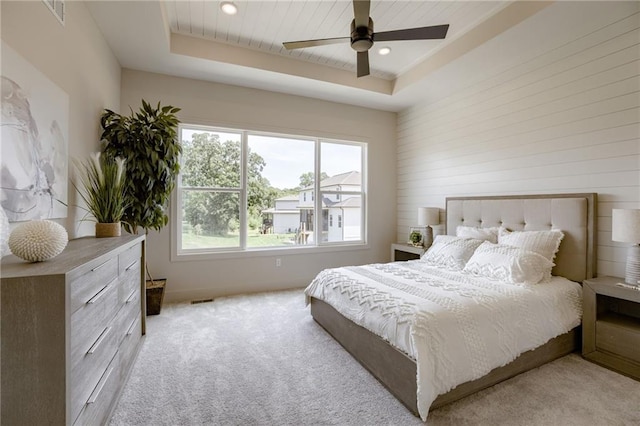 12455 N Arbor Way, Platte City, MO 64079 - carpeted bedroom featuring a tray ceiling, a ceiling fan, and recessed lighting