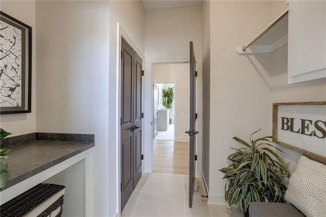 12455 N Arbor Way, Platte City, MO 64079 - corridor with light tile patterned floors and baseboards