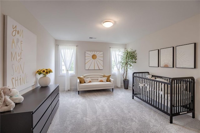 12455 N Arbor Way, Platte City, MO 64079 - bedroom with light colored carpet and a crib