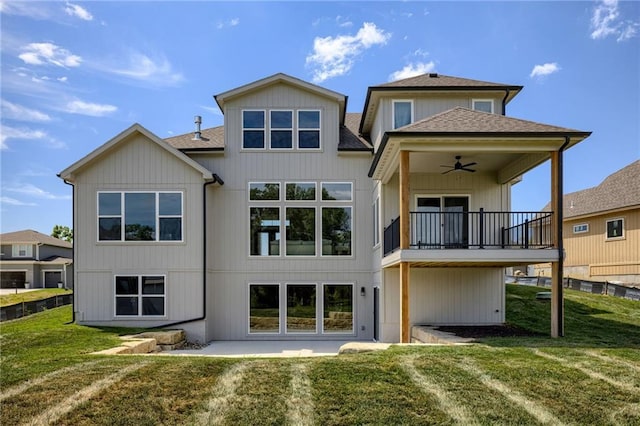 12455 N Arbor Way, Platte City, MO 64079 - back of property featuring a ceiling fan, a lawn, a balcony, and roof with shingles