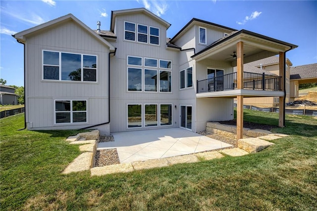 12455 N Arbor Way, Platte City, MO 64079 - back of house with a lawn, a patio area, a balcony, and a ceiling fan