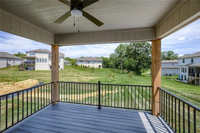 12455 N Arbor Way, Platte City, MO 64079 - deck with a ceiling fan, a residential view, and a yard