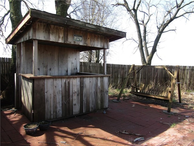 view of shed with a fenced backyard