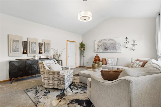 living room featuring carpet floors, baseboards, and lofted ceiling