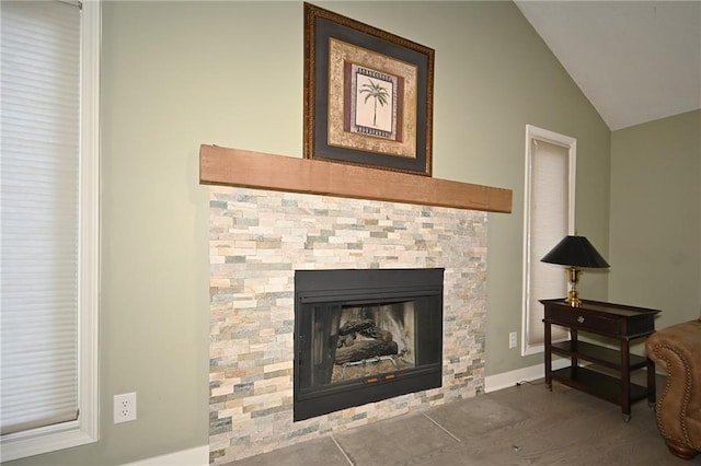 interior details featuring a fireplace and baseboards