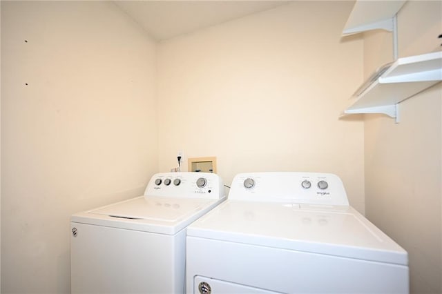 laundry room featuring laundry area and washer and clothes dryer