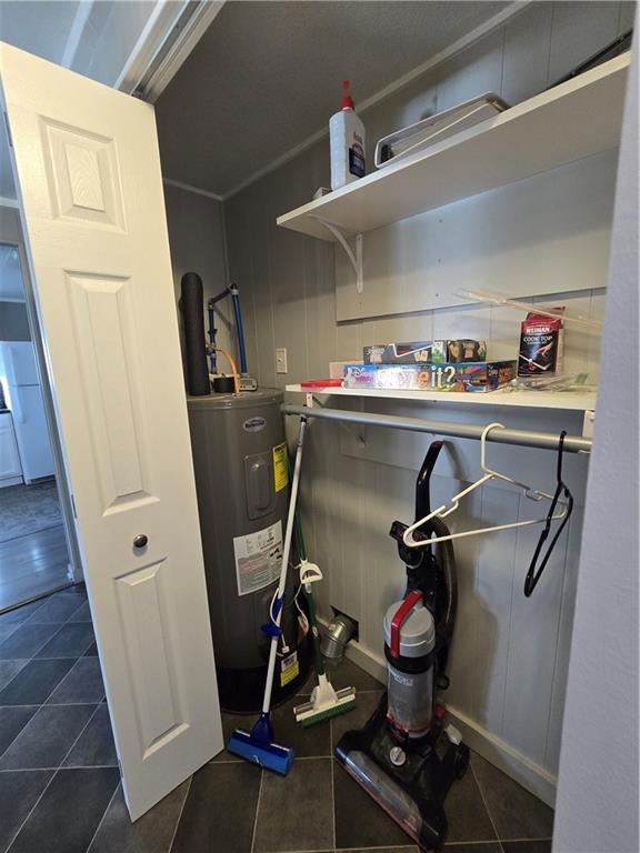 133 Lake Shore Dr, Craig, MO 64436 - utility room featuring electric water heater