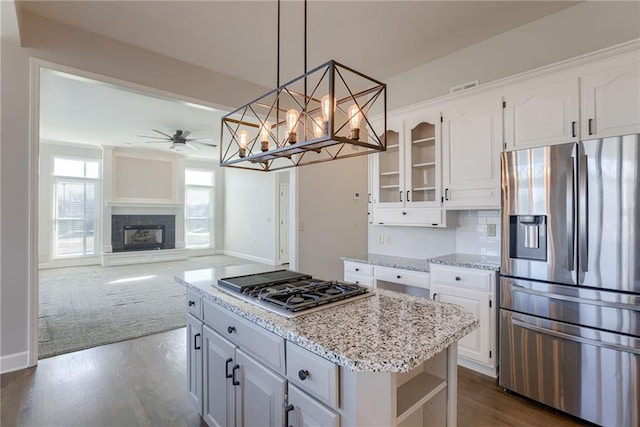 kitchen featuring visible vents, appliances with stainless steel finishes, ceiling fan, and white cabinetry