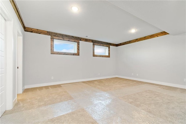 empty room featuring recessed lighting and baseboards