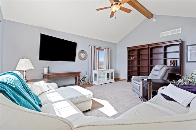 carpeted living room featuring visible vents, lofted ceiling with beams, and a ceiling fan