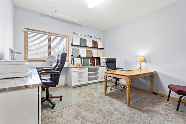 office space featuring light colored carpet and baseboards