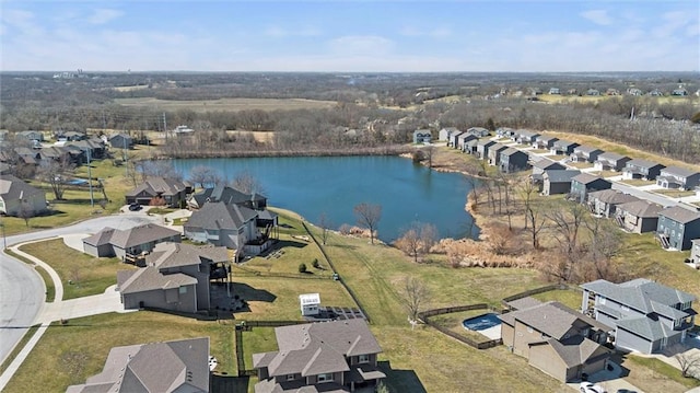 aerial view with a residential view and a water view