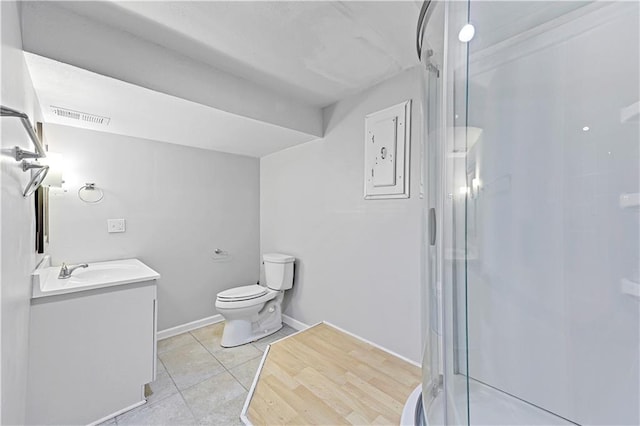 full bath featuring visible vents, toilet, a shower stall, vanity, and tile patterned flooring