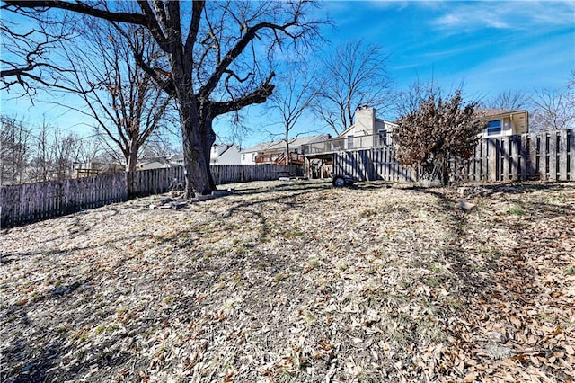 view of yard with a fenced backyard