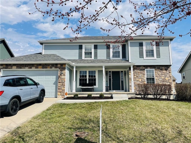 view of front of house featuring stone siding, a front lawn, concrete driveway, and an attached garage