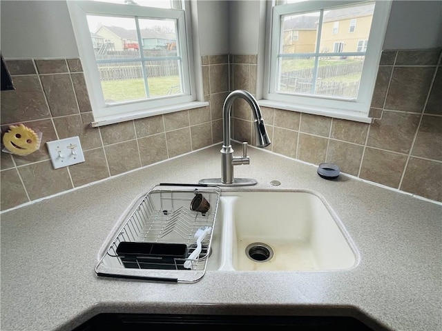 room details with light countertops and a sink