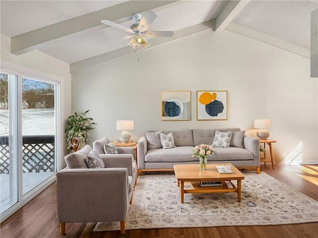 living room with ceiling fan, lofted ceiling with beams, and wood finished floors