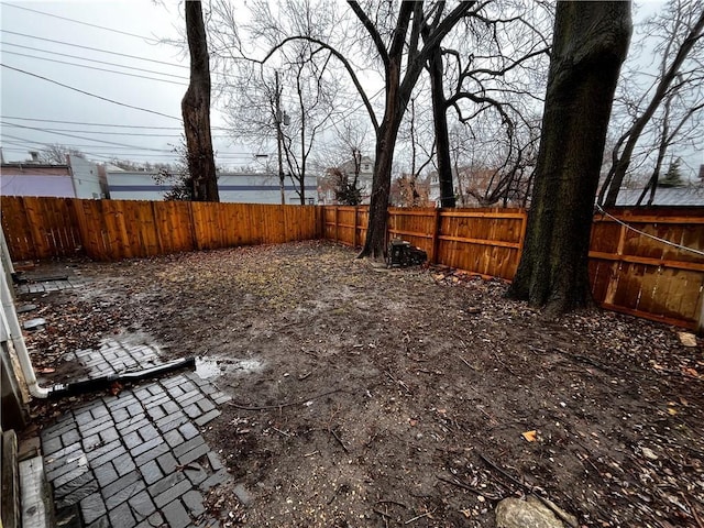 view of yard featuring a fenced backyard