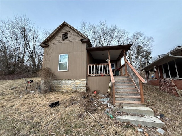 view of front of house with stairway