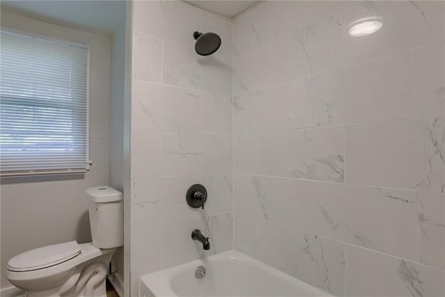 bathroom with toilet and shower / bathtub combination