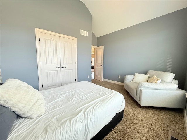 bedroom featuring carpet flooring, baseboards, visible vents, and a closet