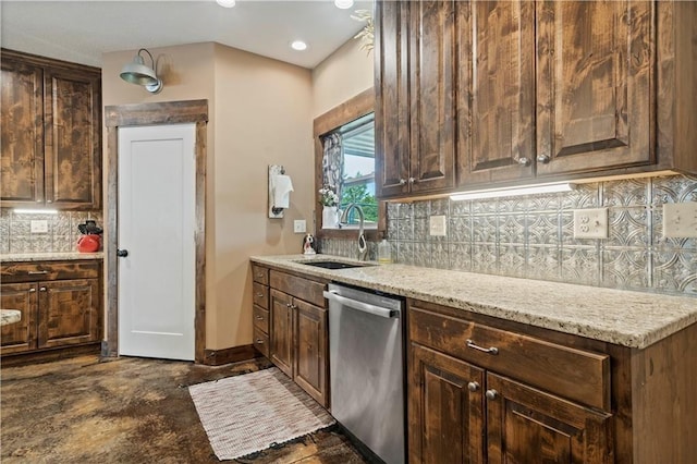 kitchen with dark brown cabinetry, dishwasher, backsplash, light stone countertops, and a sink