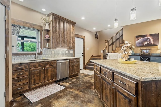 kitchen featuring backsplash, stainless steel dishwasher, dark brown cabinetry, a sink, and concrete floors