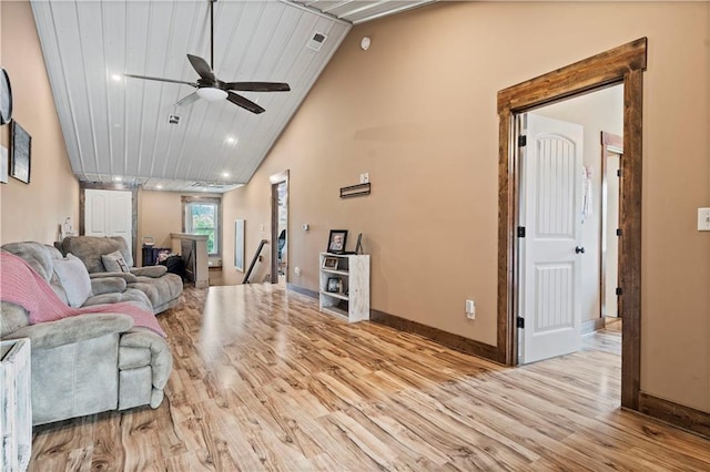 living room featuring high vaulted ceiling, recessed lighting, wood finished floors, a ceiling fan, and baseboards