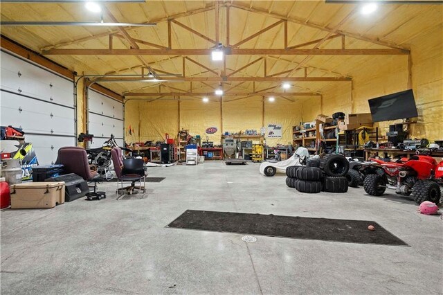 garage with a workshop area