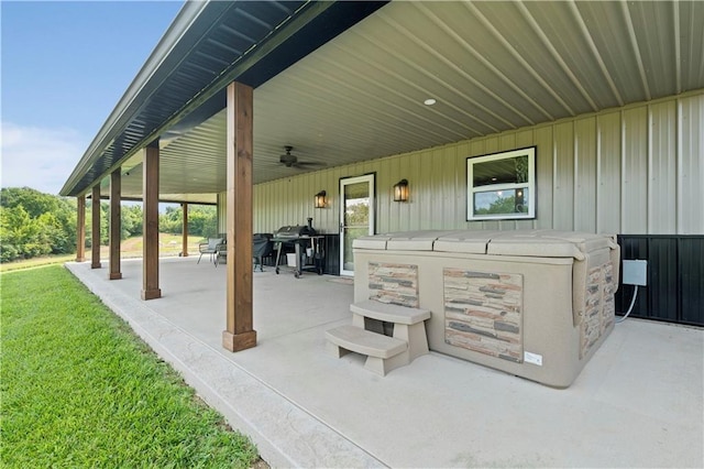 view of patio featuring a ceiling fan