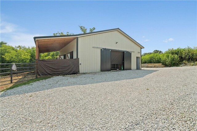 view of outbuilding featuring an exterior structure and an outdoor structure