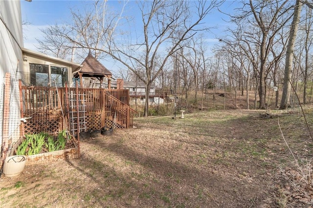 756 NW S Shore Dr, Lake Waukomis, MO 64151 - view of yard featuring a wooden deck and a gazebo