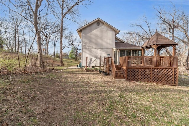 756 NW S Shore Dr, Lake Waukomis, MO 64151 - back of house featuring a gazebo, a wooden deck, and stairs