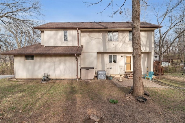 756 NW S Shore Dr, Lake Waukomis, MO 64151 - back of house with a patio, roof with shingles, entry steps, and a yard