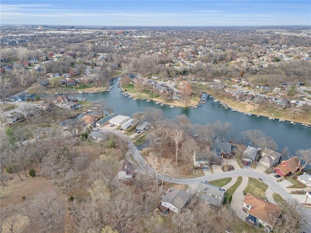 756 NW S Shore Dr, Lake Waukomis, MO 64151 - aerial overview of property's location featuring a large body of water and nearby suburban area