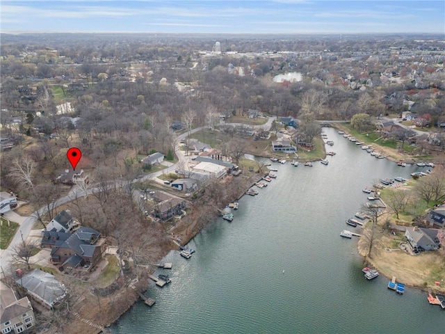 756 NW S Shore Dr, Lake Waukomis, MO 64151 - aerial view of property and surrounding area featuring a large body of water and nearby suburban area
