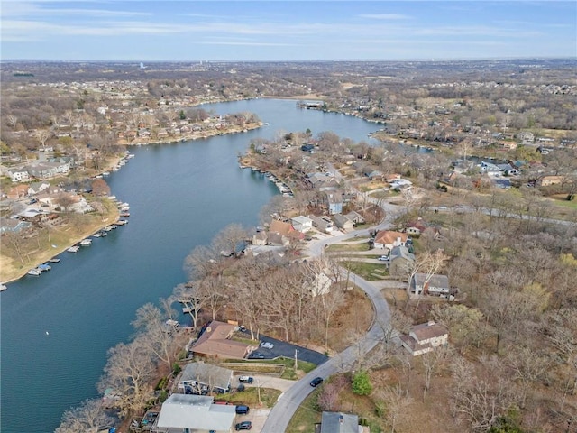 756 NW S Shore Dr, Lake Waukomis, MO 64151 - aerial view of property and surrounding area with a large body of water and nearby suburban area