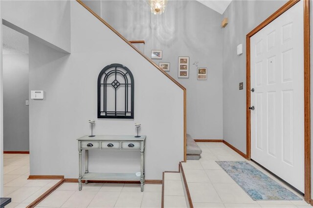 756 NW S Shore Dr, Lake Waukomis, MO 64151 - foyer with tile patterned floors and baseboards