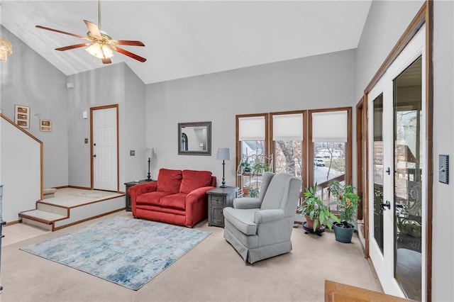 756 NW S Shore Dr, Lake Waukomis, MO 64151 - living room featuring light carpet, ceiling fan, and high vaulted ceiling