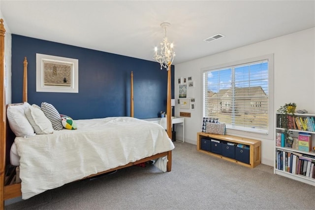 carpeted bedroom with visible vents and an inviting chandelier