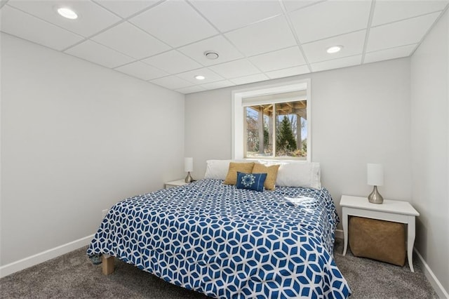 bedroom with recessed lighting, carpet, baseboards, and a drop ceiling