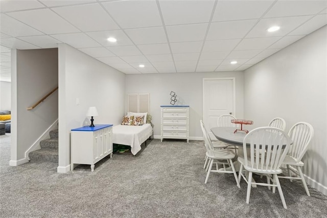 bedroom with carpet flooring, recessed lighting, baseboards, and a drop ceiling