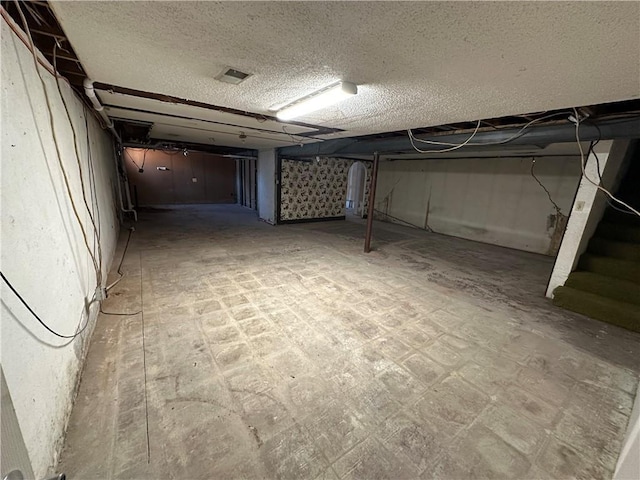 unfinished basement with tile patterned floors