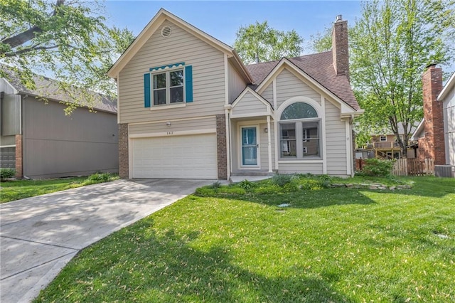 view of front of home featuring driveway, a chimney, a garage, cooling unit, and a front lawn