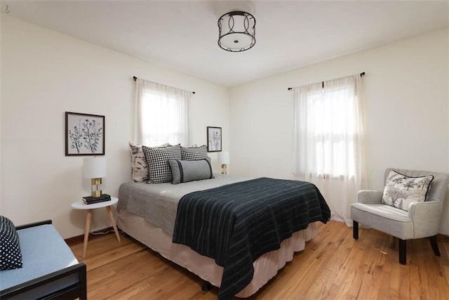 bedroom featuring light wood finished floors