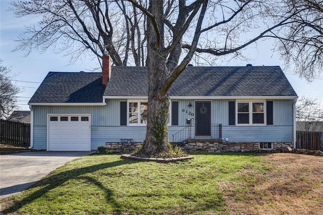 single story home with a front yard, fence, a chimney, concrete driveway, and a garage