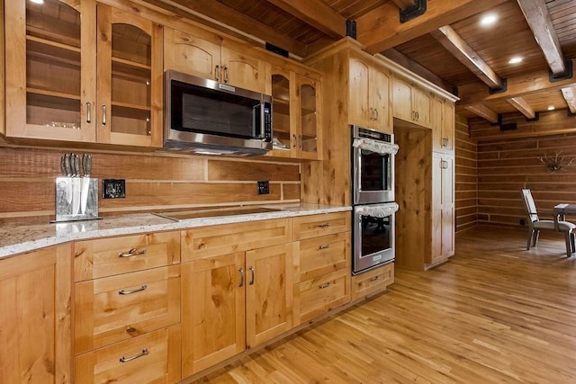 kitchen with stainless steel appliances, wooden ceiling, and light brown cabinets