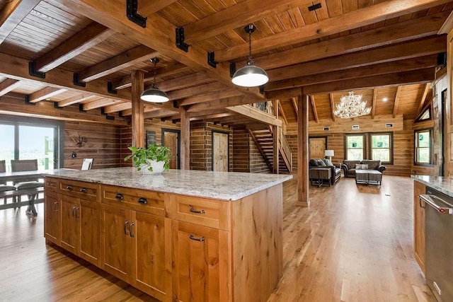 kitchen featuring wooden ceiling, wood walls, light wood-type flooring, and stainless steel dishwasher