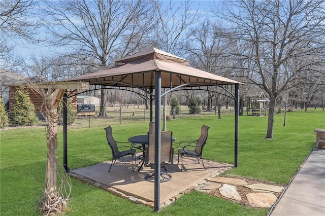 view of yard featuring a gazebo, a patio, and a carport